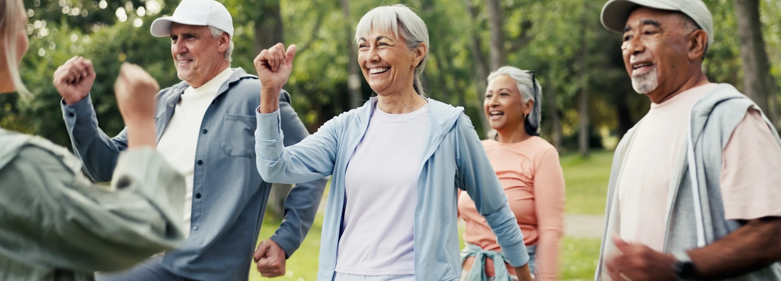 Two people outdoors active and smiling